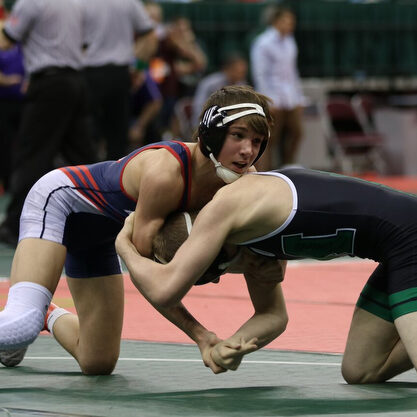 Gus Sutton from Austintown Fitch, 120# Div I against Colin Schuster of Mason.